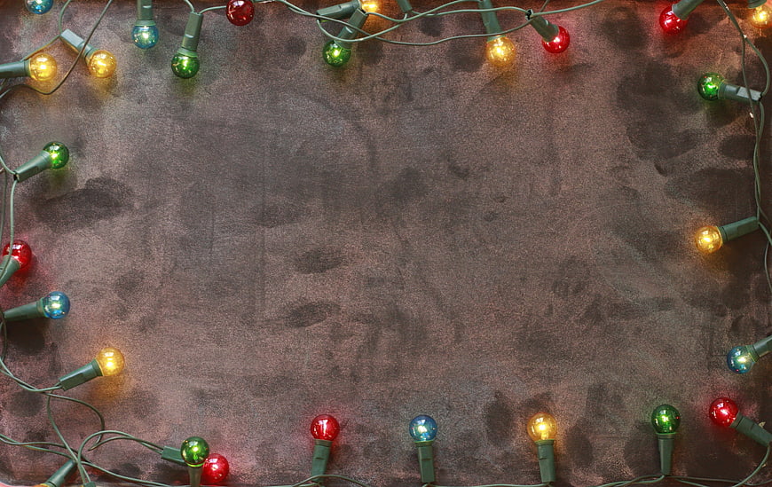 Christmas Lights Frame on Dark Textured Background