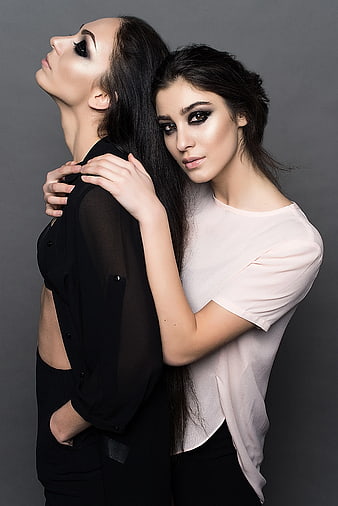 Two Women in Black and White Studio Fashion Portrait