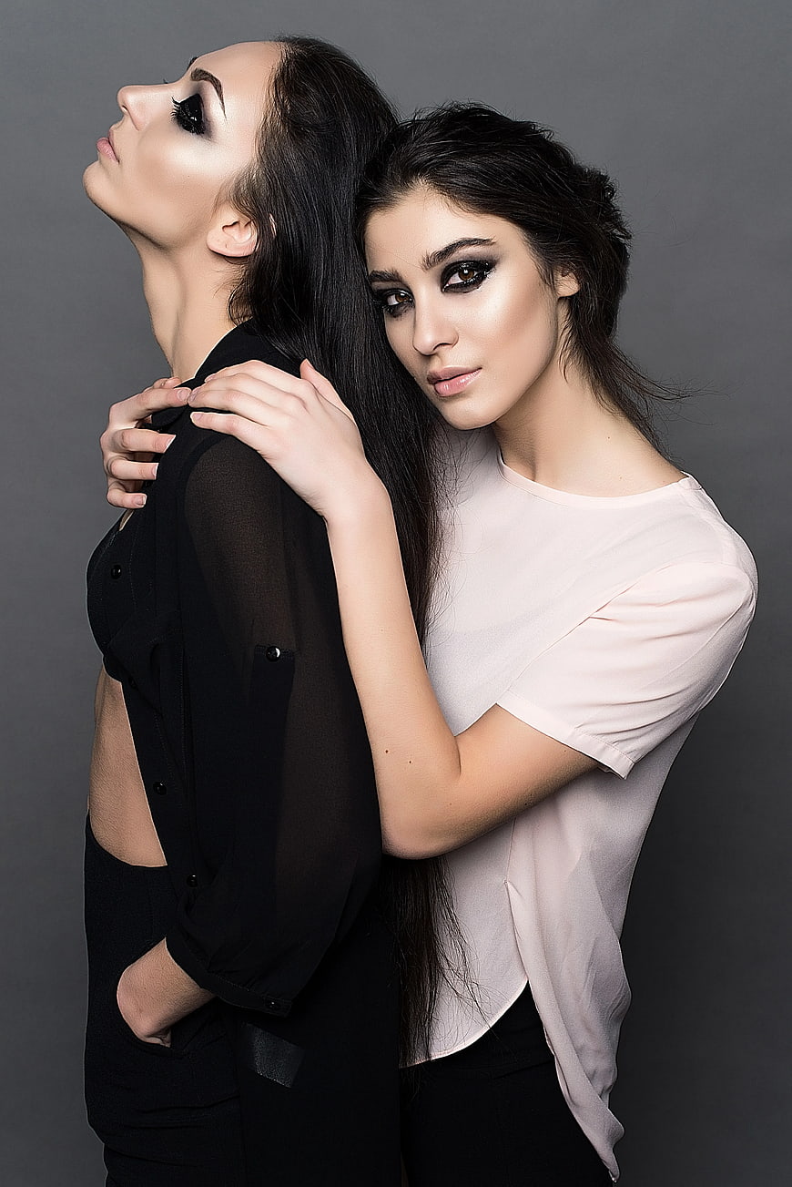 Two Women in Black and White Studio Fashion Portrait
