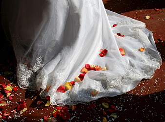 White Wedding Dress Train with Rose Petals and Confetti