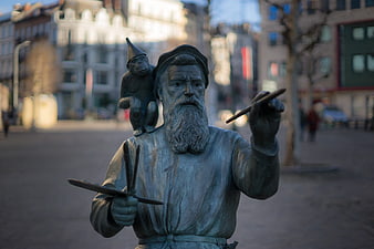 Bronze Statue of Pieter Bruegel the Elder with Monkey in Brussels