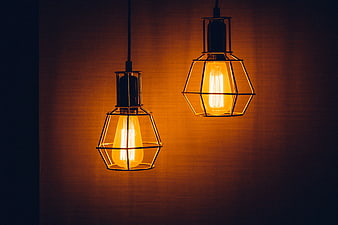 Two vintage industrial pendant lamps with Edison bulbs