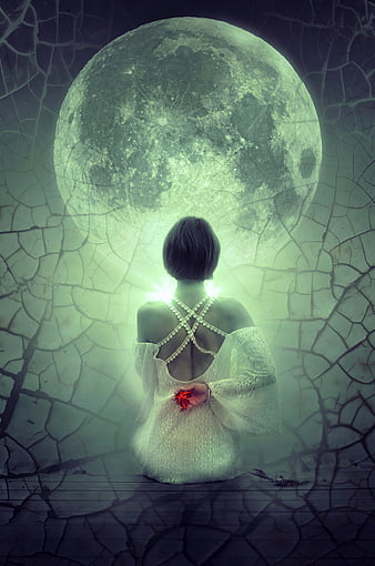 Mystical woman sitting before giant glowing green moon