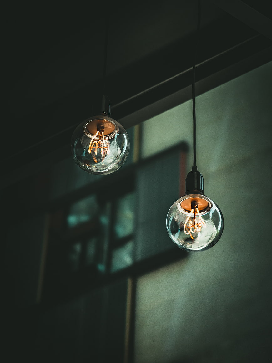 Vintage Edison Bulbs Hanging in Dim Interior