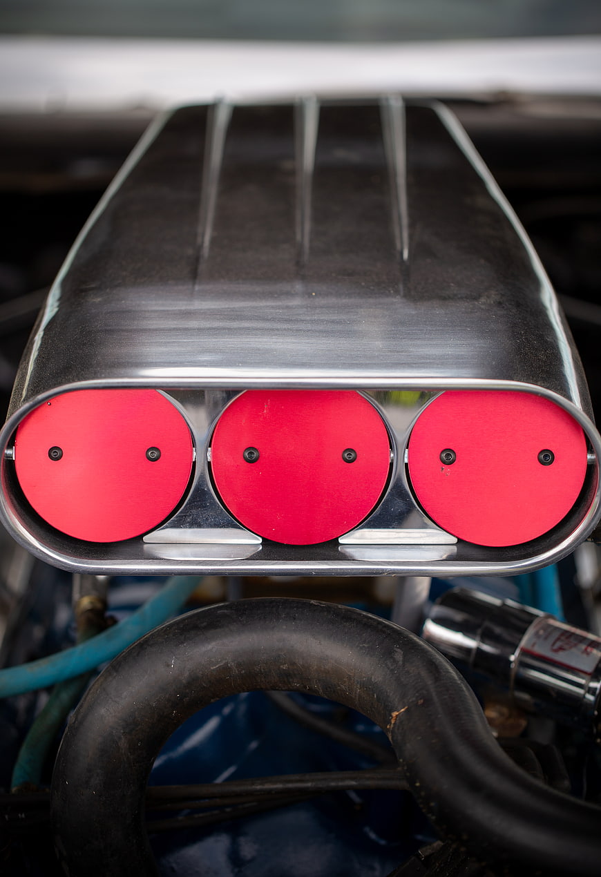 Close-up of Muscle Car Engine with Red Carburetor