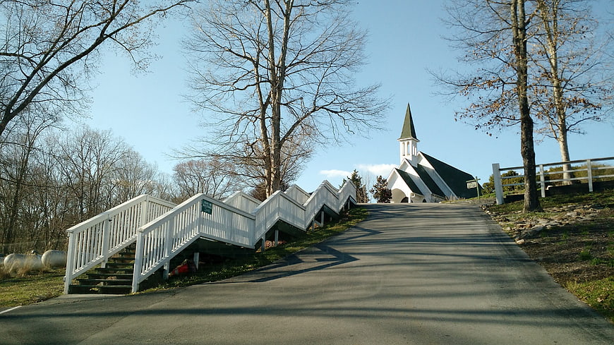 White Chapel on Hill with Zigzag Stairs and Bare Trees