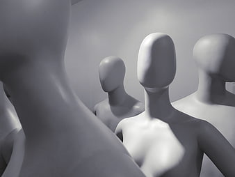 White mannequins in a minimalist virtual space