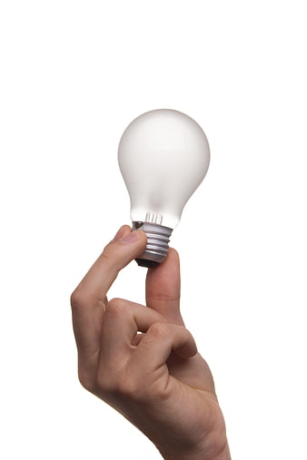 Hand holding light bulb symbolizing idea and innovation
