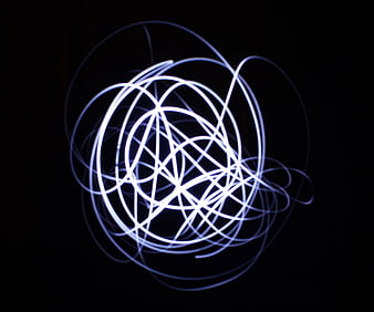 Abstract Blue Light Painting Swirls on Black Background