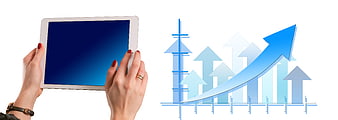 Hands holding tablet with blue screen and business growth chart