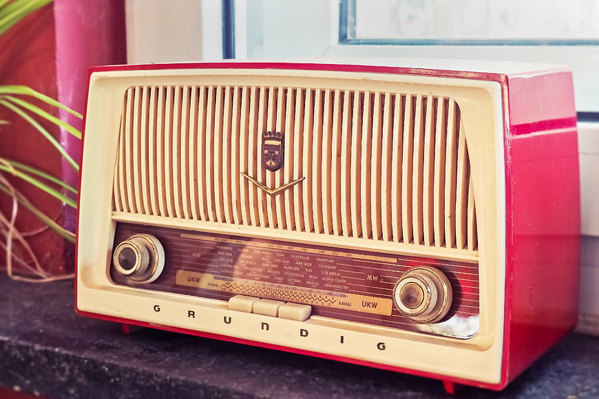 Vintage Red Grundig Radio On Stone Surface