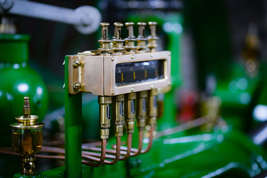 Close-up of vintage brass industrial machinery components