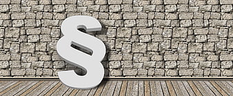 3D Paragraph Symbol on Stone Wall Background