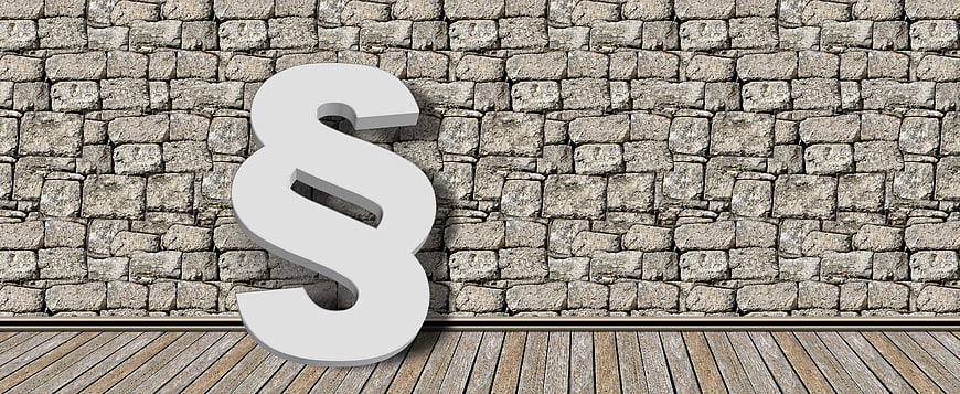 3D Paragraph Symbol on Stone Wall Background