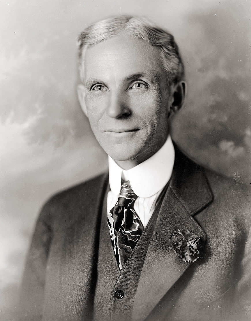 Vintage black and white portrait of Henry Ford in a suit