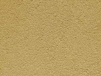 Textured beige stucco wall background