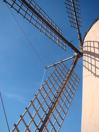Traditional Greek Windmill Against Blue Sky