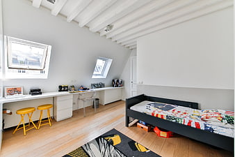 Modern Loft Bedroom With White Beams And Child Friendly Decor