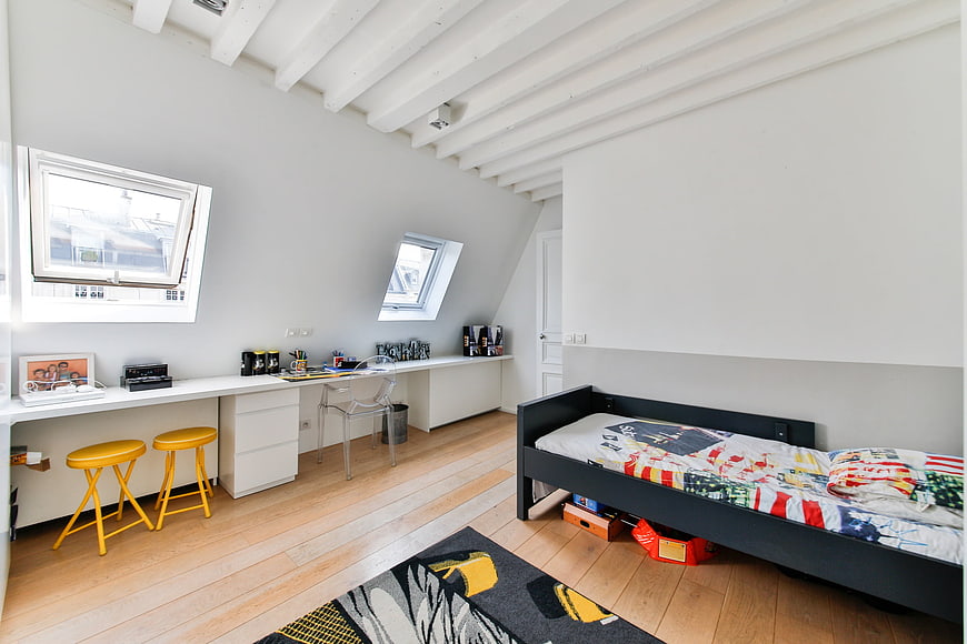 Modern Loft Bedroom With White Beams And Child Friendly Decor