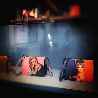 Prada handbags with pop art prints in luxury store display