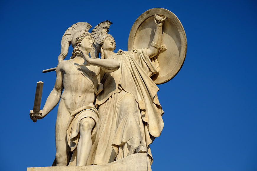Classical Marble Statue of Athena and Warrior Against Blue Sky