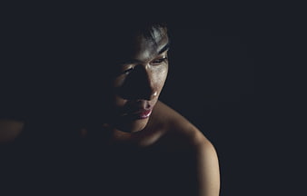 Dramatic Low-Key Portrait of Asian Woman in Profile
