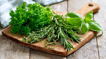 Fresh Herbs on Rustic Wooden Cutting Board