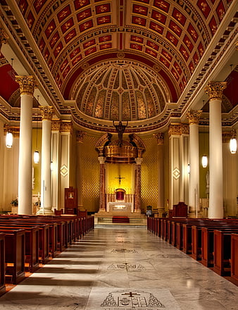 Grand Cathedral Interior with Ornate Dome and Pews