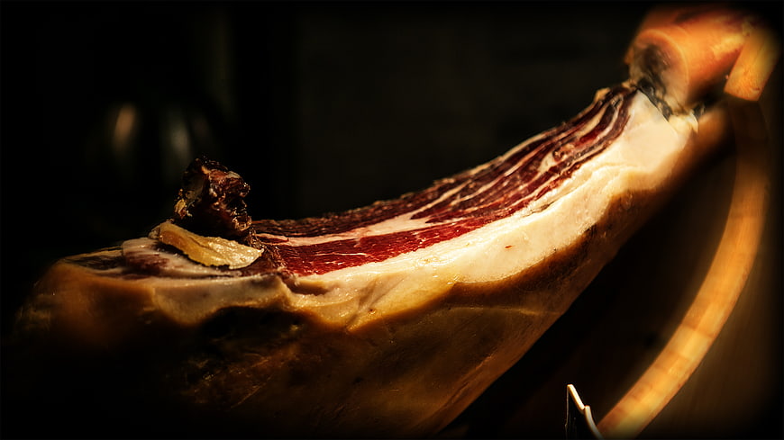 Close-up of Cured Ham Leg with Marbled Meat