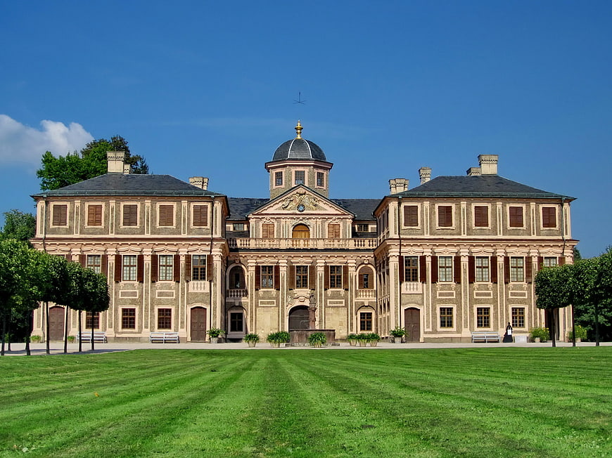 Grand Baroque Palace with Green Lawn and Blue Sky