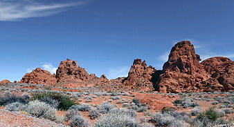 Red Rock Desert Landscape with Blue Sky and Sagebrush