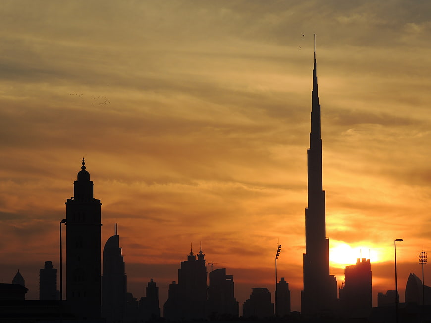 Dubai Skyline Silhouette Featuring Burj Khalifa At Sunset