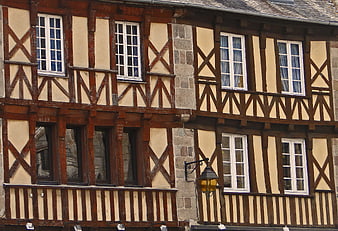 Historic French Half-Timbered House Facade With Stone And Wood Details