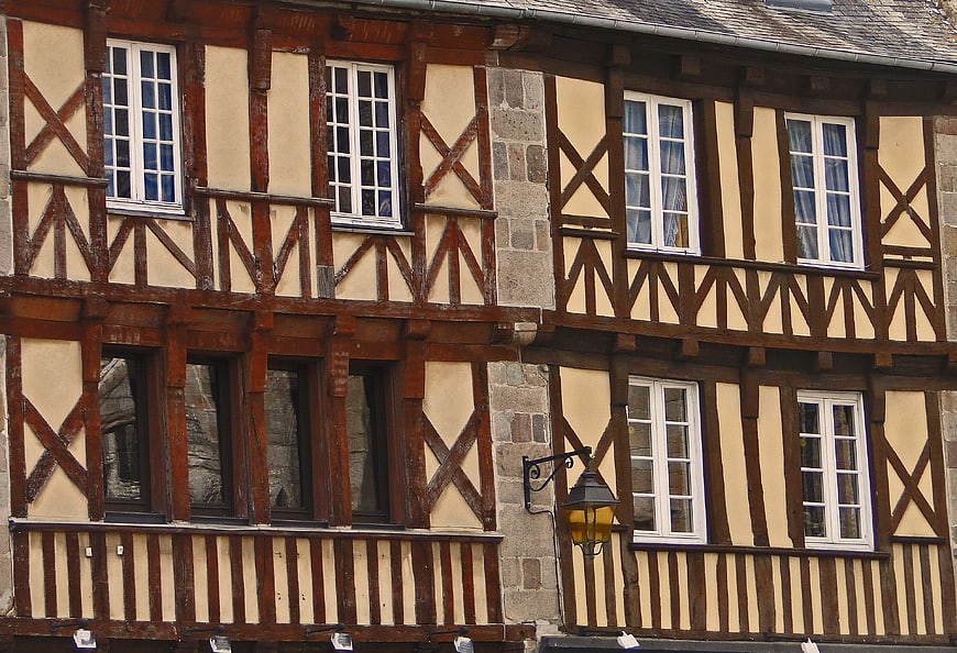 Historic French Half-Timbered House Facade With Stone And Wood Details