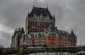 Chateau Frontenac Hotel in Old Quebec City Under Dramatic Winter Sky