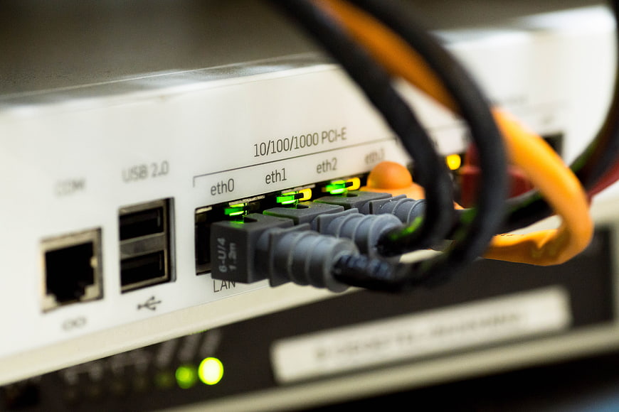 Close-up of server network ports with ethernet cables