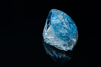 Blue Crystal Gemstone on Black Background