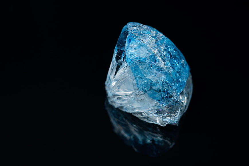 Blue Crystal Gemstone on Black Background