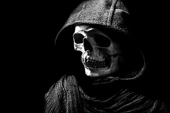 Dramatic Black and White Skull in Hooded Cloak