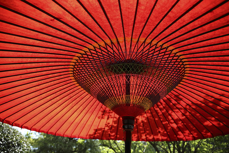 Low angle view of red traditional umbrella underside