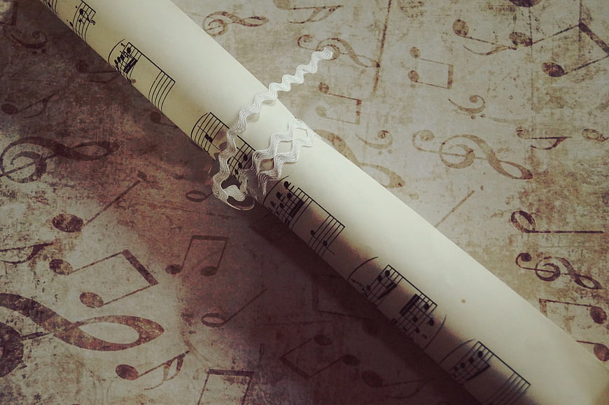 Rolled Vintage Sheet Music with Lace Ribbon
