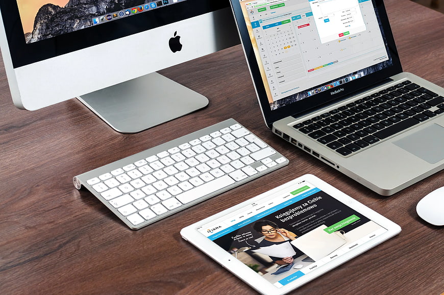 Modern Apple Workspace with iMac, MacBook, and iPad