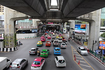 Busy Bangkok Traffic Under Skytrain Overpass