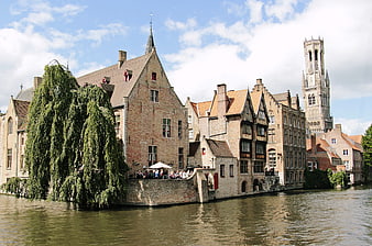 Historic Bruges Canal with Belfry Tower and Medieval Architecture