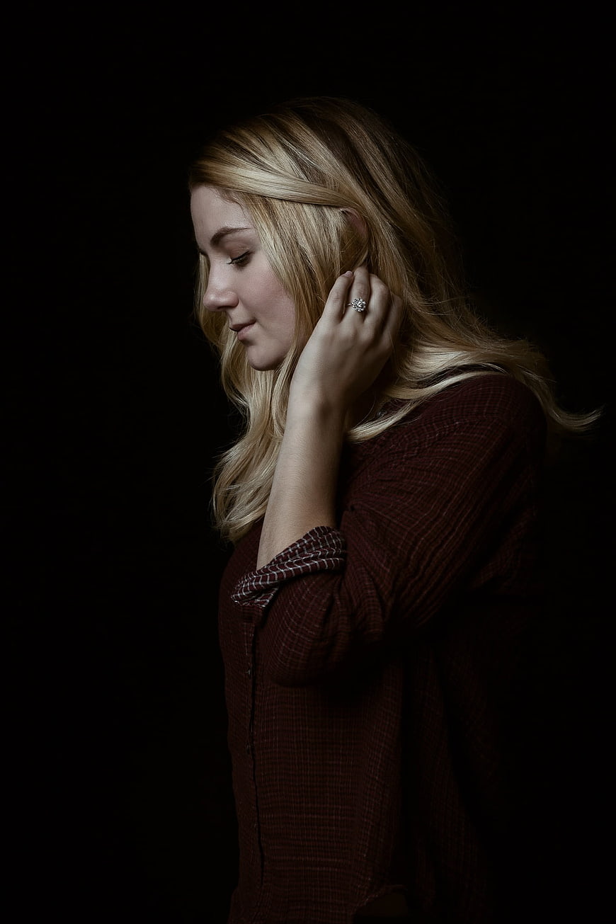Moody Studio Portrait of a Blonde Woman in Profile