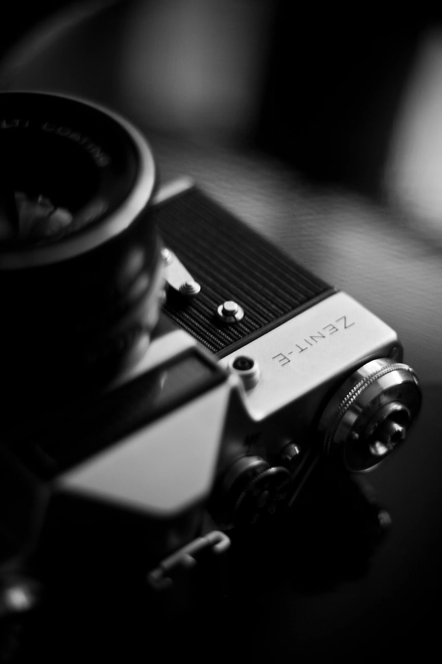 Close-up of vintage Zenit-E film camera in black and white