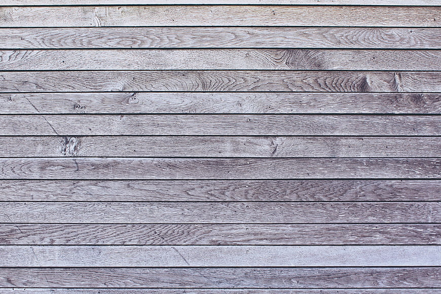 Weathered gray wooden plank texture background