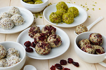 Healthy energy balls with pistachios, coconut, and cranberries