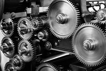 Close-up of interlocking industrial metal gears in motion