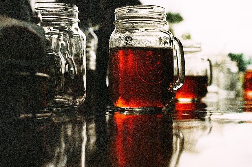 Cold Amber Beer in Mason Jar on Wet Bar Counter